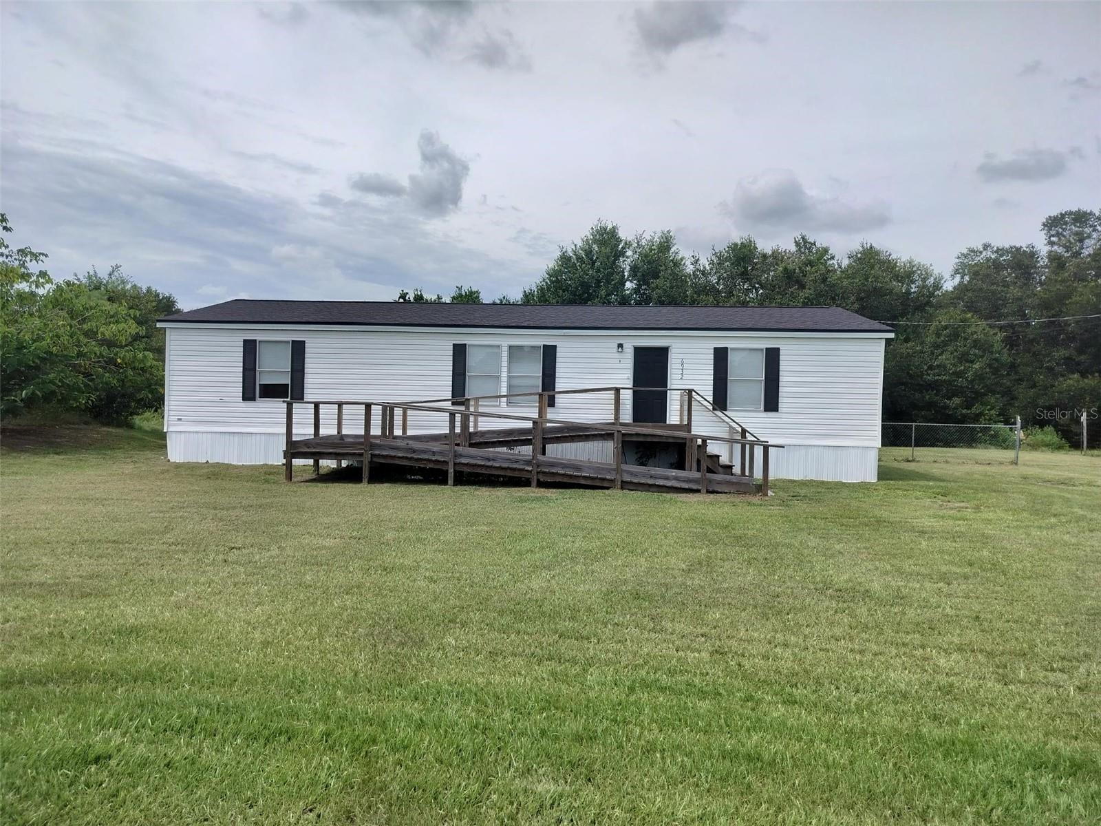 Welcome Home to this 3 bedroom/2 bath home on a 1.51 acres. NEW cabinets, granite counters and fixtures in the kitchen. The home has LVP flooring throughout and fresh paint making it move-in ready! Open floor plan with living and dining areas near the kitchen, the heart of the home. NEW skirting and Roof is less than 4 years old! Ample room for your outdoor toys, think RV, Boat, FUN, FUN, FUN. Love where you live!