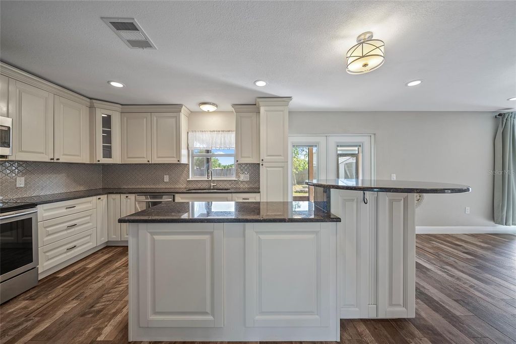 Photo of 5236 Treig Lane, Wesley Chapel, FL 33545 (MLS # TB8385302)