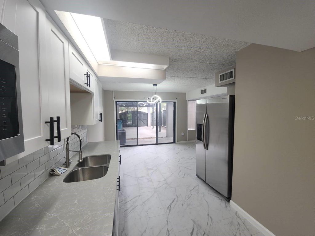 Photo of 5132 Cypress Creek Drive #104, Orlando, FL 32811 (MLS # O6409244)