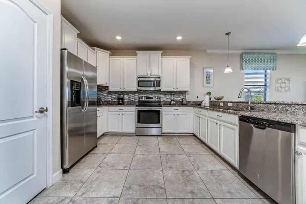 Photo of 9043 Shadow Mountain Street, Davenport, FL 33896 (MLS # O6385097)