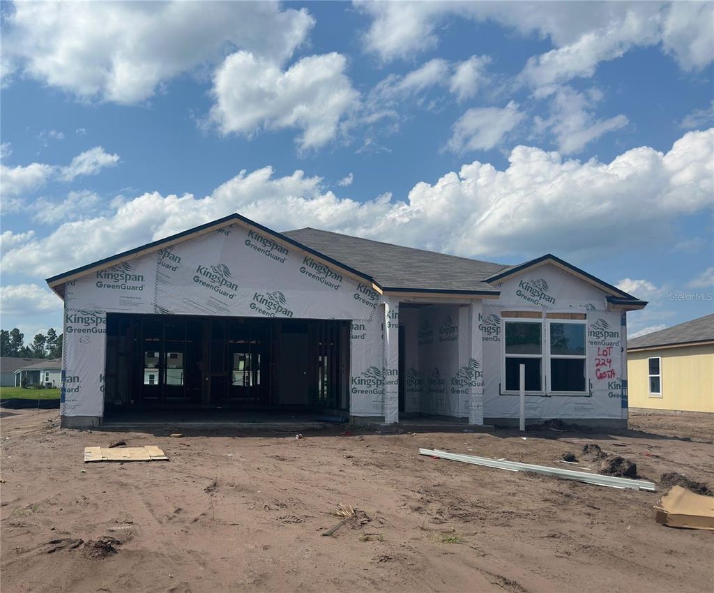 Photo of 63 Hulett Woods Road, Palm Coast, FL 32137 (MLS # FC301383)