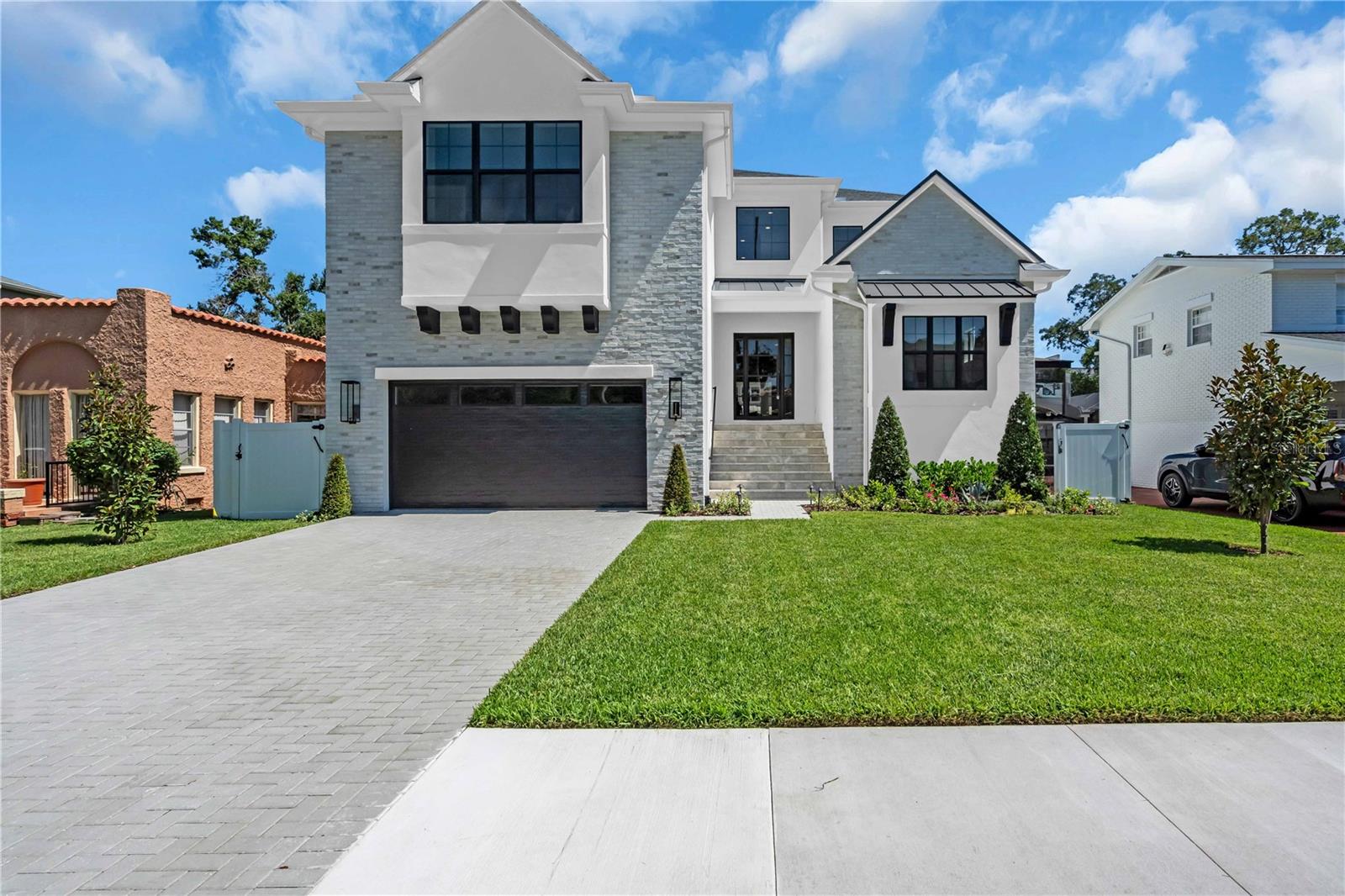 **Newly Completed** Stunning new construction by Momentum Homes in Sunset Park. This is an amazing opportunity to own a brand new home with a custom feel that won't last long!
The quality of construction and attention to detail are on display with 10' ceilings, solid core doors, wide 10" plank wood floors, oversized crown molding, and square box beams.
This home is an entertainer's dream with a large waterfall edge island, panel-ready Thermador appliances, a Butler's Pantry with wine fridge, AND a Scullery behind a secret door! The great room is spacious with large sliding doors overlooking your covered porch, outdoor kitchen, and pool. A first floor guest suite is tucked away as a retreat for your visitors.
Upstairs is the luxurious primary suite, complete with a spa-like bathroom and oversized his and hers closets. Each of the additional bedrooms is generously sized and feature walk in closets and en-suite baths, offering privacy and comfort for family or guests.
Designed for modern living, this home also features a cozy den, ideal for a home office or reading nook, and a versatile bonus room that can be tailored to your needs—whether it’s a media room, playroom, or home gym.
Finally, the safety features are unmatched with solid block construction, impact doors and windows, elevated above the FEMA requirements, and the entire home is prewired for a whole home generator.
Located in Sunset Park, it's zoned for A rated schools Mabry, Coleman, and Plant and is convenient to all that South Tampa has to offer!