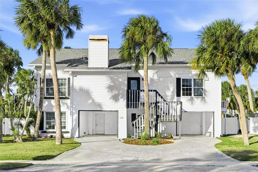 Handy man special!  This is your opportunity to get more home for less money on Anna Maria Island!  NEW ROOF 2025!  This spacious elevated home offers 2 floors of living space. The bottom floor includes covered parking and a large area for play or storage for your beach gear. The second floor has a large family room with vaulted ceilings that centers around a stone wood burning fireplace & lots of natural light. There is also a separate dining room, kitchen, laundry, double master en-suite bedroom and a 2nd bedroom. The third floor has a large master en-suite bathroom and a 4th bedroom. Spacious garage & storage rooms with large fully enclosed yard with 6' vinyl fence & plenty of room for a pool.  This home is conveniently located just 2 blocks from the sugar sand beaches of Anna Maria Island & located 1 b block from the free island trolley.  Within 1 hour of 3 major airports: Tampa International, Sarasota/Bradenton & St Pete/Clearwater, walking distance to shopping, dining & island attractions.