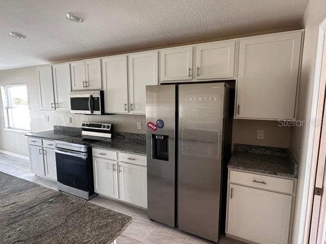 Photo of 1073 Silas Street, Haines City, FL 33844 (MLS # TB8560491)