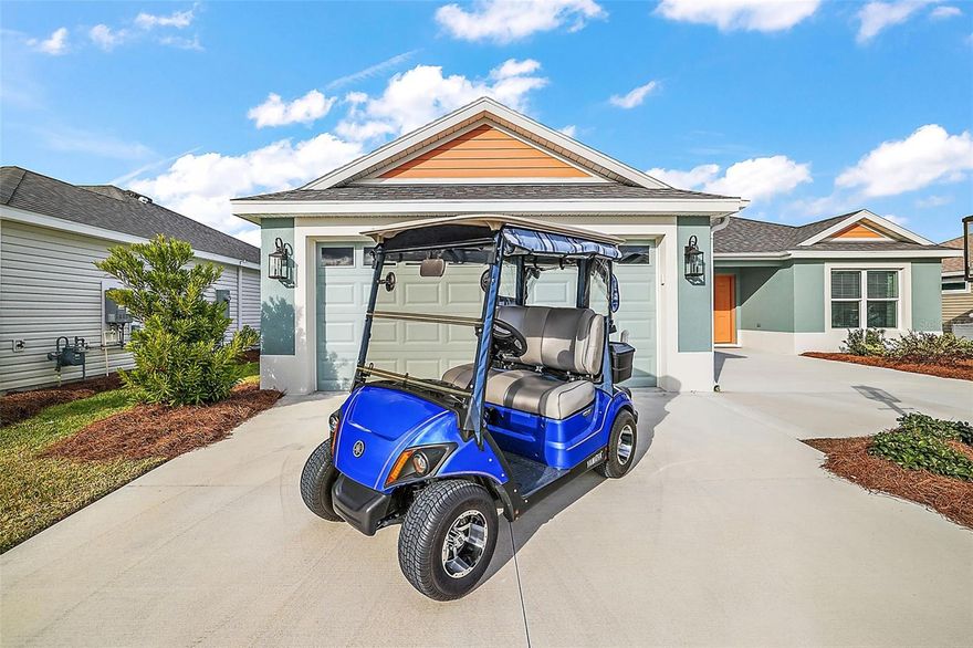 WELCOME to this charming FURNISHED / TURNKEY 3 Bedroom home, which includes 2019 Yamaha Golf Cart. This gorgeous home is nestled in The Village of Newell, located minutes away from the highly sought after Sawgrass Grove Area where you will enjoy nightly entertainment and restaurants along with shopping at the nearby Magnolia Plaza. Golf lovers will enjoy the easy access to nearby golf courses, as well as many other activities that The Villagers come to enjoy such as Pickleball, Tennis, Hike and Bike Trails not to mention the various daily activities at the nearby recreation centers and swimming pools. Come and enjoy this lovely split open floor plan. Large Master suite features private bath and roman tiled shower, double sinks and two walk-in closets. This Professionally decorated Designer home offers quartz countertops in both kitchen and bathrooms, ceiling fans, sink in Utility room, enclosed Florida / Bonus room, with lots of light. Exterior features screened in lanai for outdoor entertainment and a grilling pad just outside the lanai. Luxury Vinyl Plank flooring in Main Living areas, white cabinetry in Kitchen and Baths. With this TURNKEY home, all you need is your toothbrush to start living the dream of a Villager. Do not miss the opportunity to make this Fully Furnished home yours in a great location of The Villages, Come and Enjoy all that the Villages Has to Offer, it's more than a Home it's a LIFESTYLE.