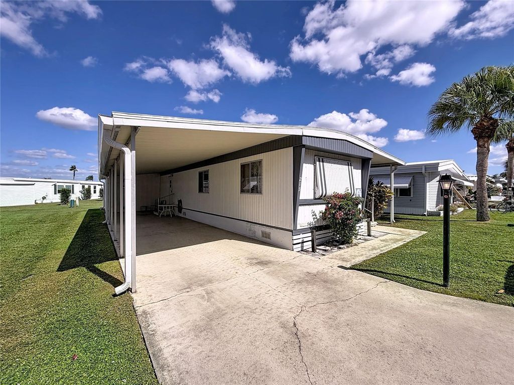 Photo of 213 Lakeside Ranch Circle, Winter Haven, FL 33881 (MLS # S5136995)