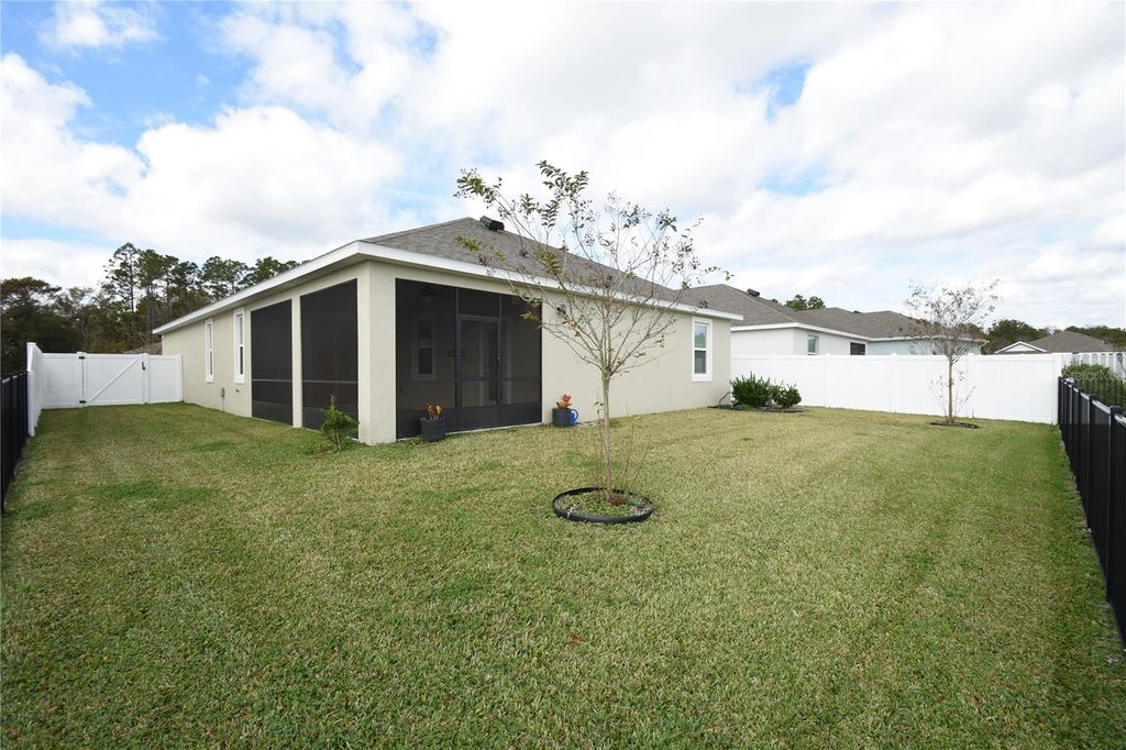 Photo of 59 Oakleaf Way, Palm Coast, FL 32137 (MLS # FC314518)
