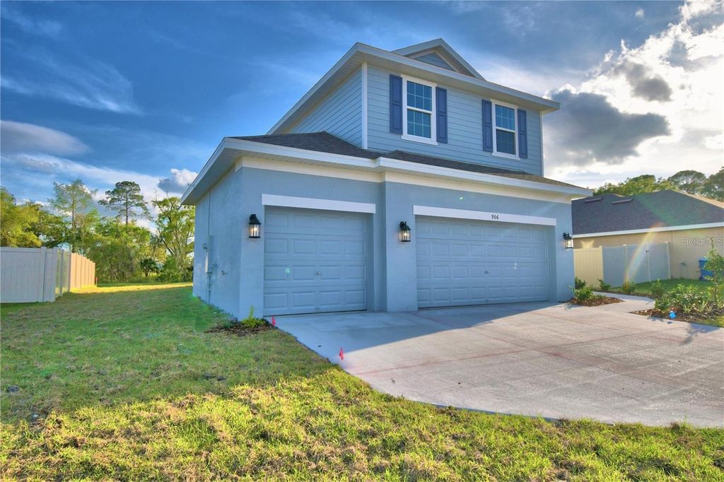 Photo of 906 Sofia Lane, Davenport, FL 33837 (MLS # O6411436)