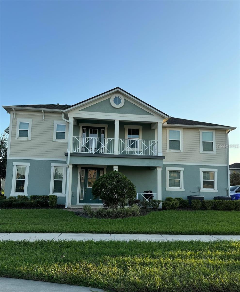 Two-story corner unit townhouse with three bedrooms and 2.5 bathrooms near the center of Kissimmee. Inside a gated community with plenty of features including a gate guard, a pool, parks, a fitness center, a lake, and a clubhouse. Located 2.5 miles away from two shopping centers (The Loop and Plaza Del Sol) and a Publix. Tile first floor, carpet second floor. A door on the second floor leads to a balcony.