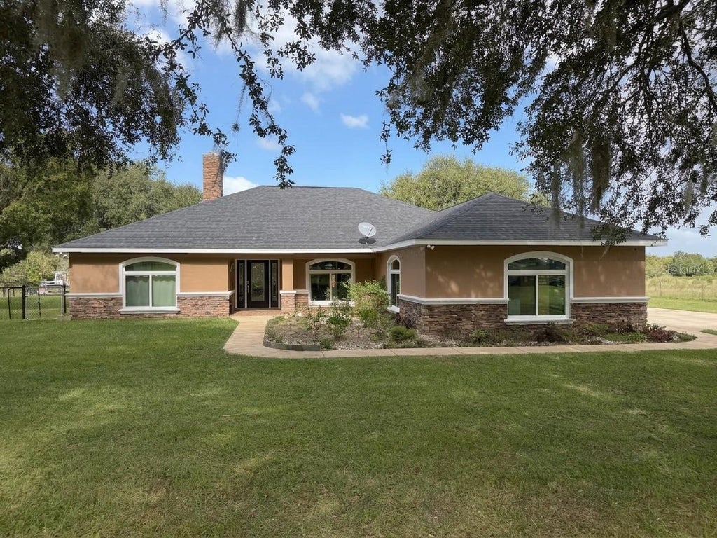 Photo of 20765 SW 36th Street, Dunnellon, FL 34431 (MLS # OM734735)