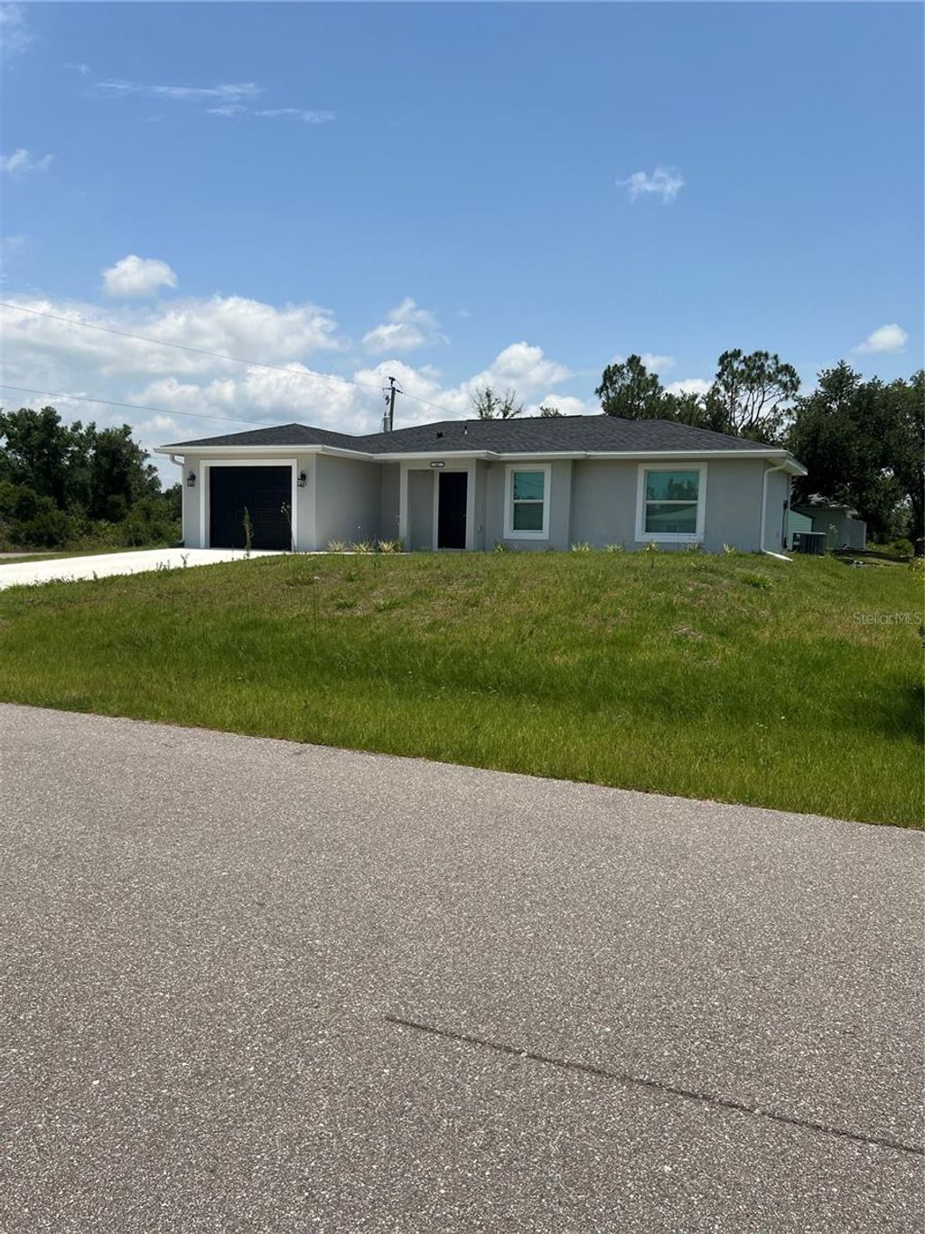Photo of 68 Evergreen Street, Punta Gorda, FL 33982 (MLS # C7519854)