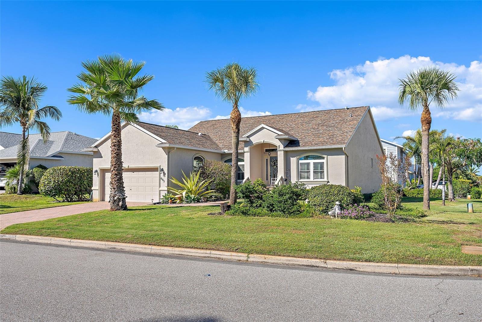 On a sunny corner lot in Tierra Verde’s coveted Monte Cristo neighborhood, this elegant single-level home stands out for its timeless design and graceful floor plan. Vaulted ceilings, fine Italian tile flooring, and beautiful architectural elements create an eminently enjoyable interior space in a premier island location.
The great room centers around a fireplace framed by French doors leading to the screened lanai—an inviting setting for inspired entertainment or quiet relaxation. The adjoining dining area and open kitchen create a seamless gathering space with warm wood cabinetry, granite countertops, a gas cooktop, and stainless-steel appliances.
In addition to the three bedrooms, a dedicated office with French doors and custom built-ins offers an ideal work-from-home retreat, while the private owner’s suite provides a peaceful haven with a spa-inspired bath, dual vanities, a walk-in shower, and a soaking tub. Two additional bedrooms and a beautifully updated guest bath complete the interior layout.
Outdoors, enjoy year-round living on the screened lanai with an outdoor kitchen and Jacuzzi spa, surrounded by lush landscaping for privacy. With block construction, a two-car garage, and an enviable location just moments from Tierra Verde’s dining, marinas, and the beaches of Fort De Soto, this home blends island charm with everyday practicality.
Life on Tierra Verde is unlike anywhere else. This serene residential island rests between the award-winning beaches of the Gulf and the cultural energy of downtown St. Petersburg, offering deep-water marinas, waterfront dining, and direct access to the open Gulf of Mexico. A true boating and outdoor paradise, it’s a place where neighbors still wave, nature surrounds you, and every day feels a little like vacation.