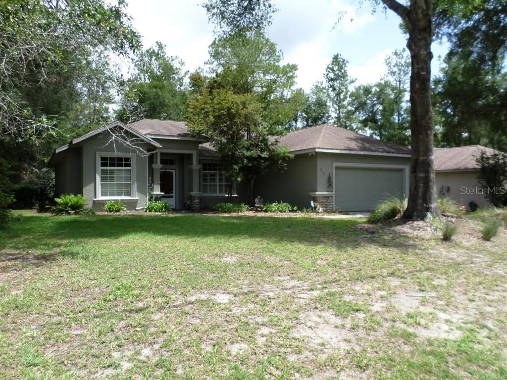 Photo of 9419 N Country Club Way, Dunnellon, FL 34434 (MLS # OM727117)