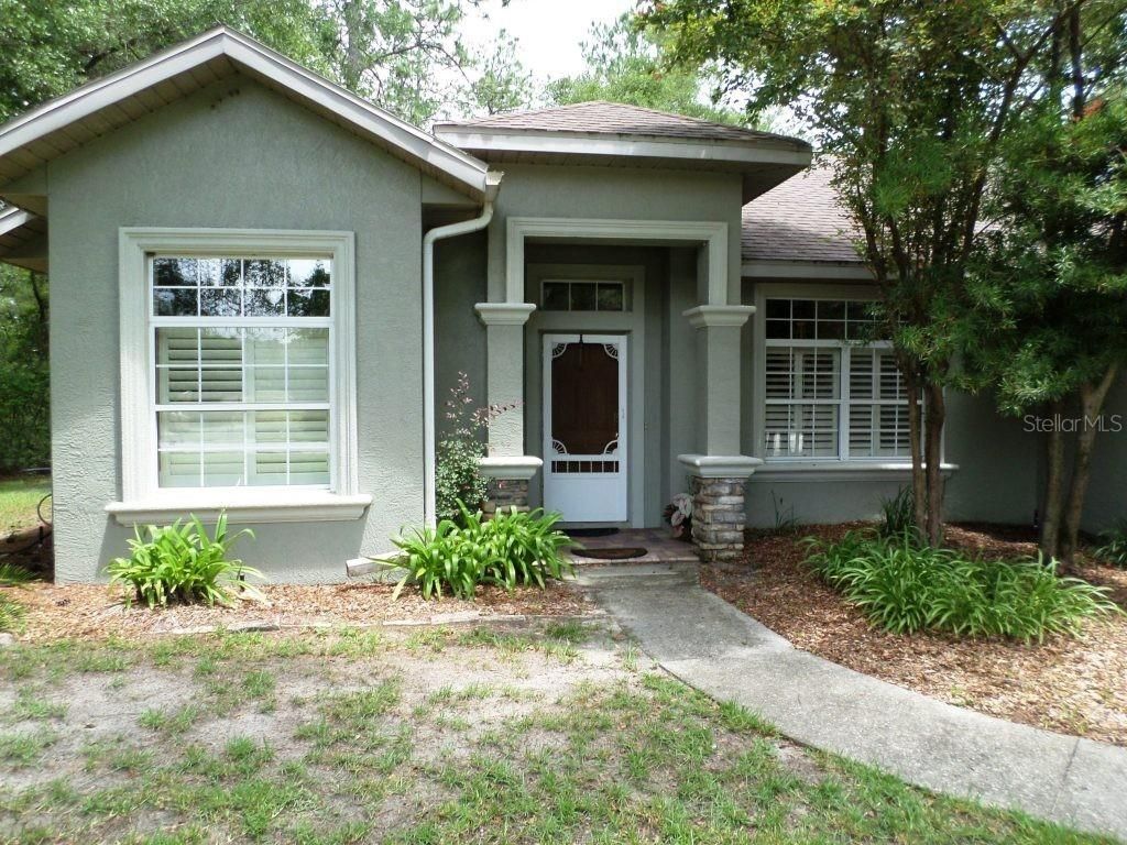 Photo of 9419 N Country Club Way, Dunnellon, FL 34434 (MLS # OM727117)