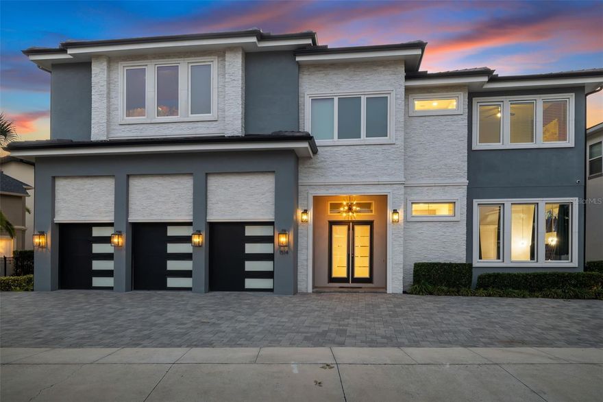 The Modern Jewel at Reunion!  This turnkey 7,450 SQFT home with full golf privileges sits on a premier lot overlooking the Arnold Palmer Golf Course.  This home is the perfect Disney Vacation Rental for large families, groups of friends, and those wanting to experience a truly magical trip.  With the ability to accommodate 22 guests this home features ten bedrooms, with 7 of them being luxurious primary suites.  The three other rooms are custom designed for imagination and enjoyment.  9 full bathrooms, and 2 half baths give plenty of space for your large travel party to get ready or wind down for the day.  The outdoor living space features a 30-foot west facing custom private pool and spa, a full outdoor kitchen, dining area, sound system, and brand new furniture to enjoy while watching others play in the pool during the day, and the sunset at night.

The vast amounts of bed and baths aren't just what makes this property so special.  It's the amenities that normally you'd have to pay for which are all under one roof!  No need to leave the house to go to the movies when you can walk down the hallway to the private home theatre to continue the Disney vibe after hitting the theme parks.  Interested in going to an arcade or amusement center there's no need to hit Dave & Busters when you can enjoy the arcade, jumbotron, skee-ball, pop-a-shot, air hockey, foosball, billiards, video games, and a half court basketball area.  Located right by an owners/tenant access gate this property makes it incredibly easy to get in and out of the Reunion community.

With a proven rental history thru Magical Vacation Homes property management this unit will be an amazing portfolio addition for those looking for an Orlando/Disney property that they can use for their own personal use as well.  This property is a landlord's dream as it's perfect for week long summer vacations with friends and young families, spring break and holiday trips with large extended families, sporting event and golf trip long weekends with college buddies, and for those looking to visit the number one vacation destination in the country...Walt Disney World.