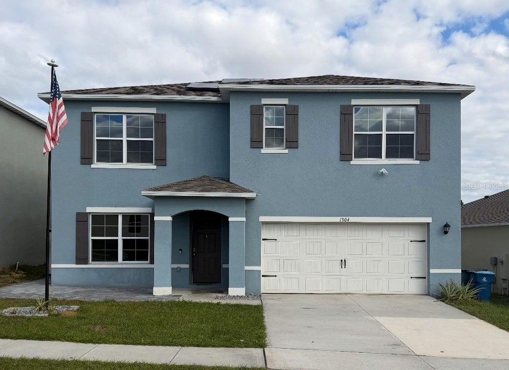 Photo of 1304 Sugarwood Street, Davenport, FL 33837 (MLS # R4912166)