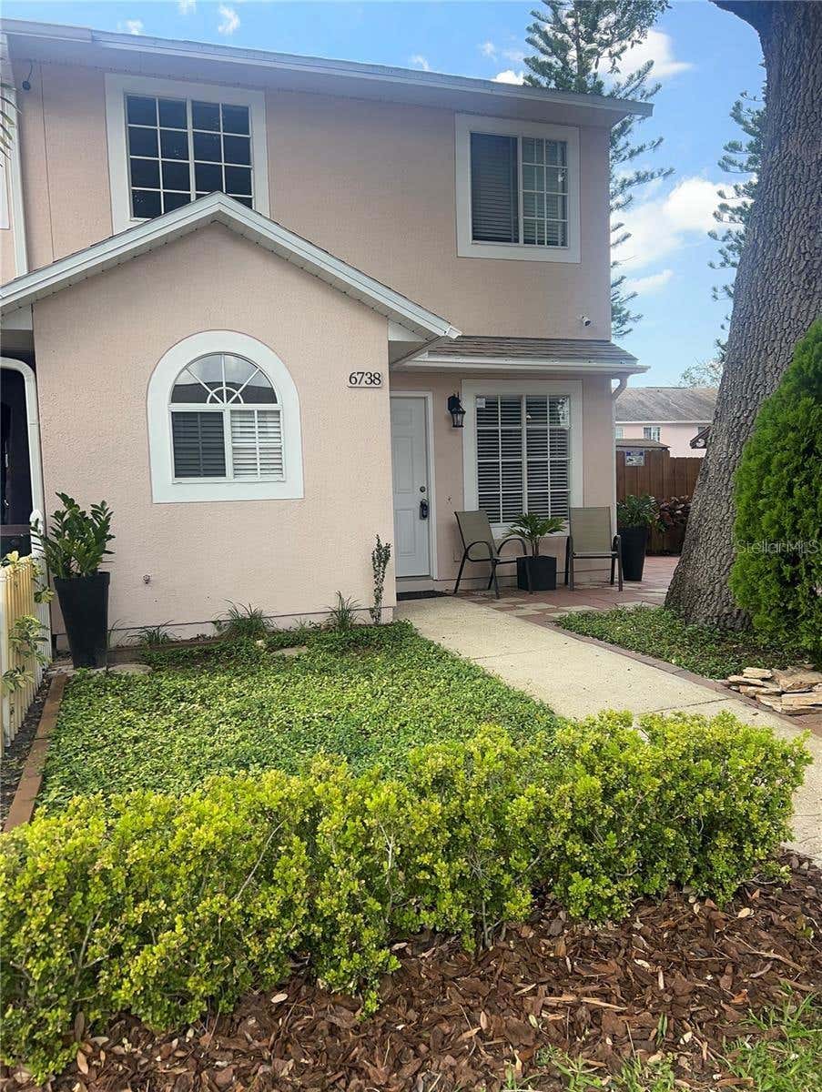 Photo of 6738 Magnolia Pointe Circle, Orlando, FL 32810 (MLS # O6417825)