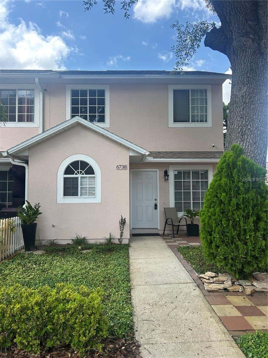 Photo of 6738 Magnolia Pointe Circle, Orlando, FL 32810 (MLS # O6417825)