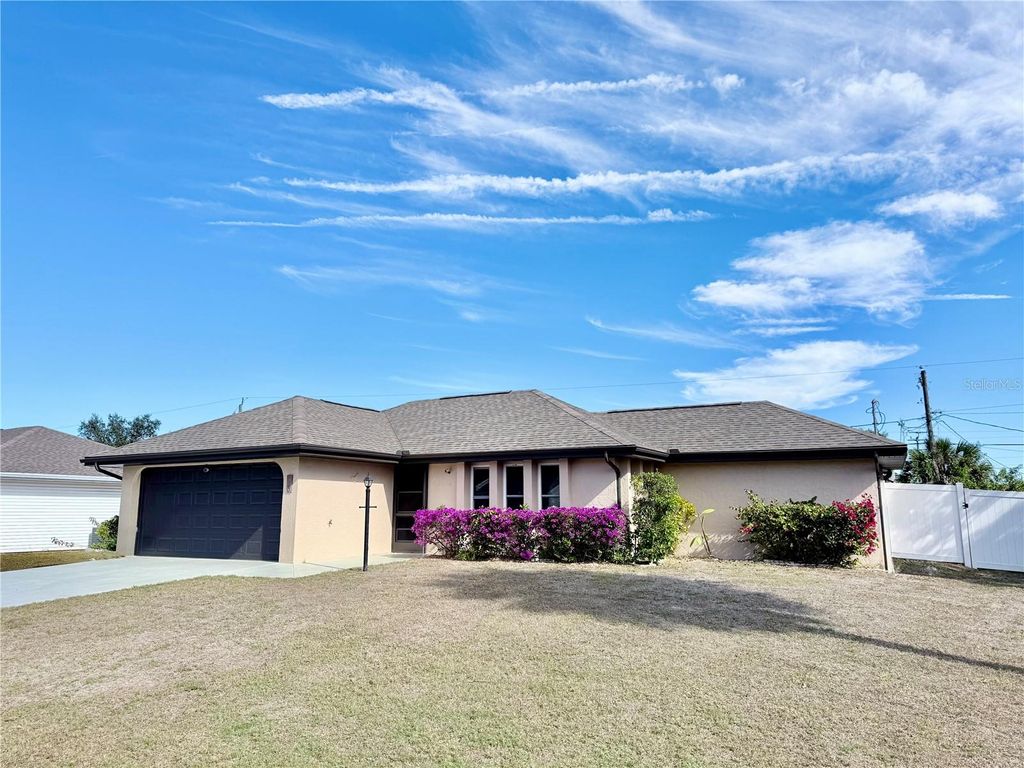 Photo of 520 Fletcher Street, Port Charlotte, FL 33954 (MLS # C7519267)