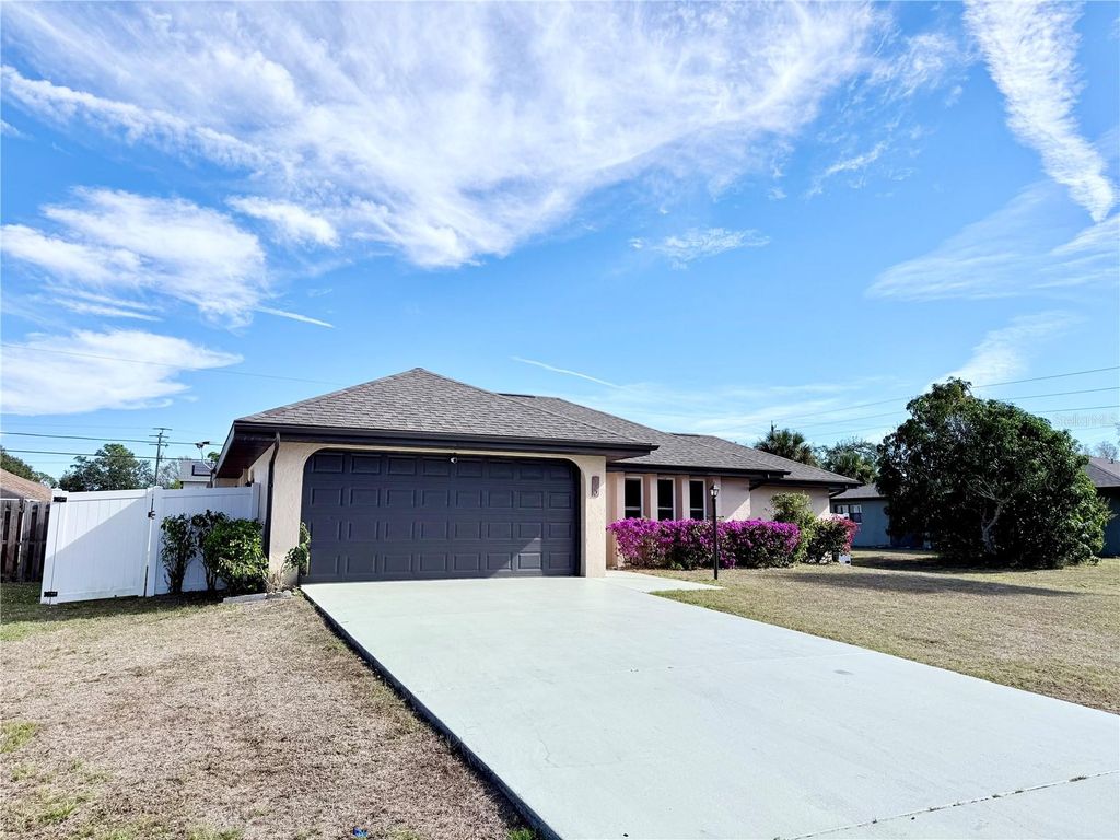 Photo of 520 Fletcher Street, Port Charlotte, FL 33954 (MLS # C7519267)