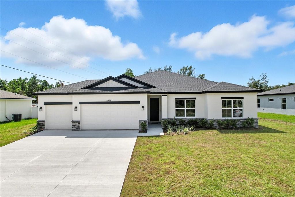 Photo of 2998 SW 131st Place Road, Ocala, FL 34473 (MLS # O6344256)