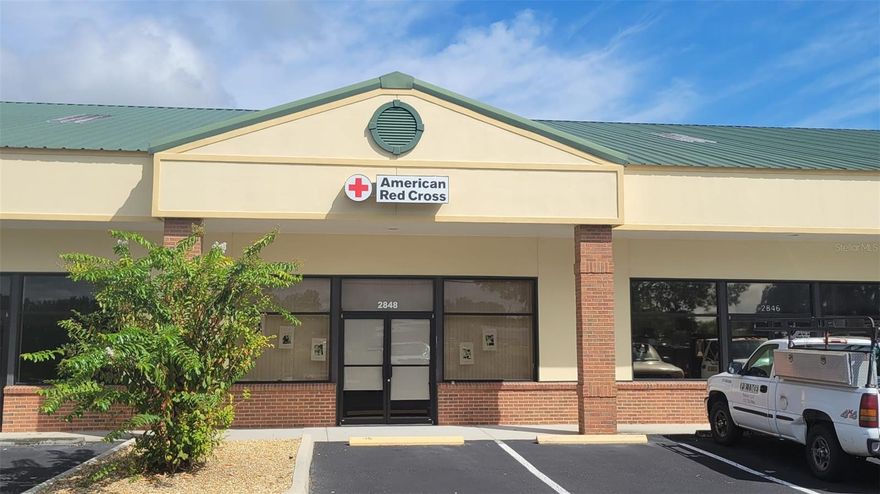 This office/warehouse facility offers mixed-use potential, including light manufacturing. It features two private offices, a conference room, and a warehouse with a 14-foot roll-up door. Located in the Leesburg Commerce Park, the unit faces W Main Street, providing excellent visibility, and benefits from ample parking in a well-lit lot. The park's convenient location is just outside The Villages and easily accessible from Highway 27, I-75, and the Turnpike.