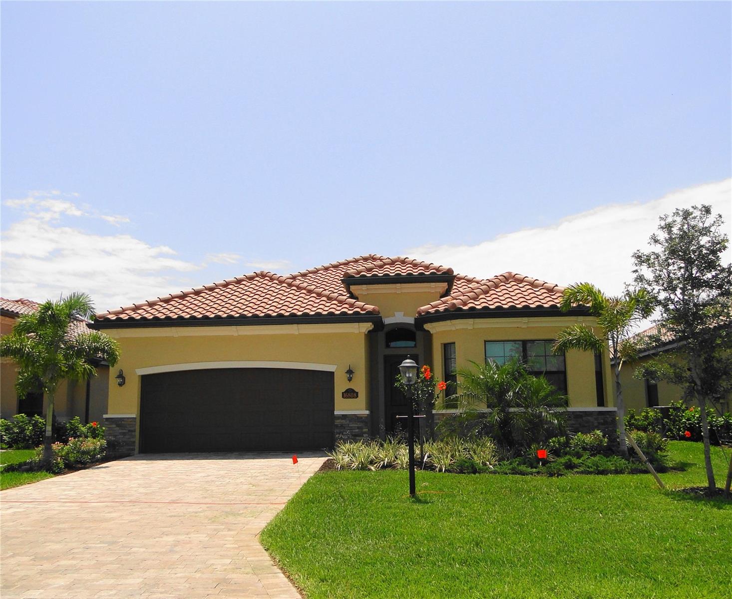 LAKEWOOD RANCH. Astonishing SINGLE-FAMILY HOME located in the prestige gate resort style & golf community of Lakewood National. Hard to pass this magnificent home with 3 bedrooms, 2 bathrooms, 2 car garage, screened lanai with heated pool/spa and summer kitchen. Open plan home with split bedrooms, professional decorated and turnkey furnished. Step into the main areas where the living-dining-kitchen-lanai comes together as one, excellent for entertainment. Huge chef kitchen with gas stove, stainless steel appliances, granite counters, wood cabinets, huge pantry, huge center island that overlooks the living room/ lanai. A laundry room with state-of-the-art washer and dryer with access to the 2-car garage. Lanai, big enough for entertain with summer kitchen, gas heated pool and spa overlooks the tranquil lake behind the house. Master bedroom with King size bed, access to lanai, walk-in closet. Master bathroom with double sinks, roman tub, walk-in shower and private toilet room. On the other side of the house, you will find 2 more rooms and a 2nd bathroom. Home is located in a cul-de-sac making the street is very private. Lakewood National is a gated community in Lakewood Ranch located between Lakewood Ranch Blvd and Lorraine Rd; with a challenging golf course, clubhouse with resort style pool, fitness center, aerobics center, yoga studio, tennis courts, tiki bar/ outside restaurant, massage center, beauty parlor, and more. Membership transfers of $642.00 allow you use of amenities & to play golf all you pay is cart fee. More great news, home is DOG friendly, so you can bring poochy here. Short distance to downtown Lakewood Ranch, groceries sores, medical facilities, schools, entertainment, Lakewood Ranch Memorial Hospital, I-75, SR 64, beaches of Anna Maria Island, Siesta Key, Coquina Beach, Longboat Key, downtown Sarasota, Tampa, St. Pete. High Season $12,000. Off season $5,500 + utilities. Welcome HOME.. Welcome to Paradise! Available annual turkey furnished at $5,500 per month + expenses
