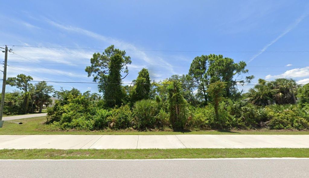 Photo of 10163 Hallendale Drive, Port Charlotte, FL 33981 (MLS # D6148114)