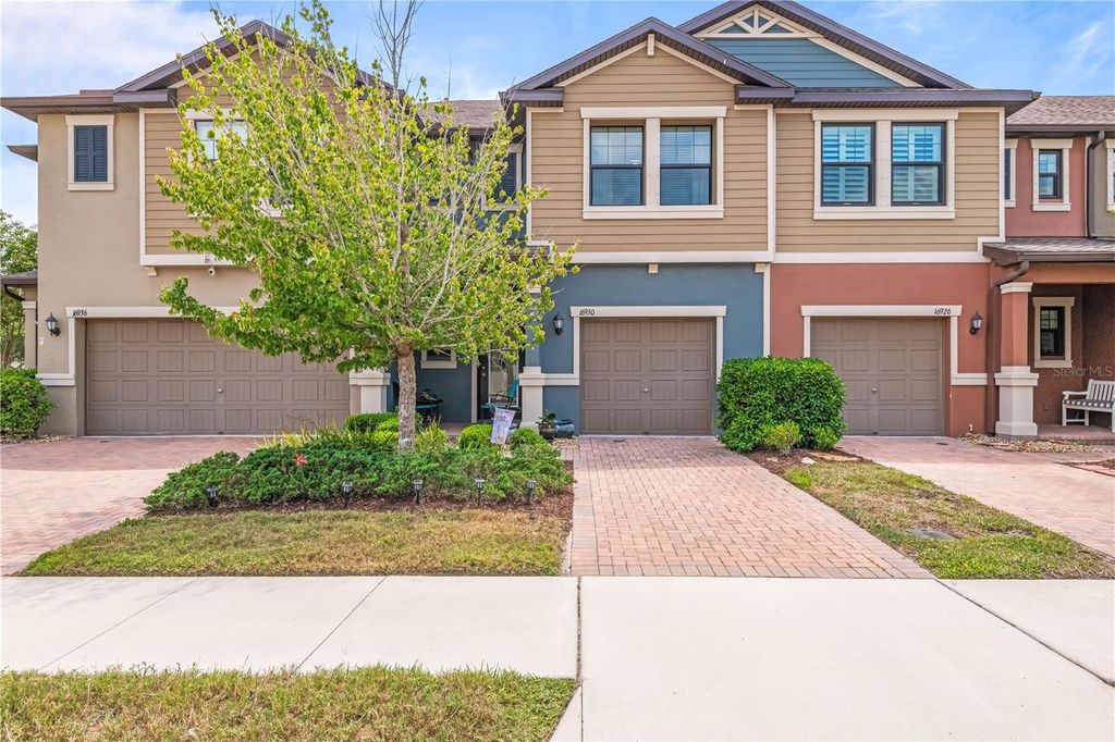 Photo of 16930 Red Brick Lane, Land O Lakes, FL 34638 (MLS # TB8378202)