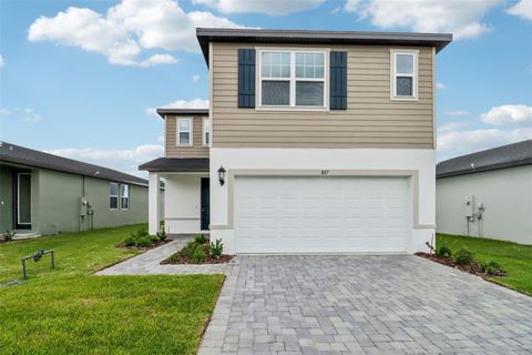 Photo of 807 Sunshower Drive, Lady Lake, FL 32159 (MLS # O6372014)