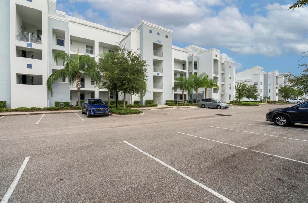 Photo of 4741 Clock Tower Drive #203, Kissimmee, FL 34746 (MLS # O6422815)