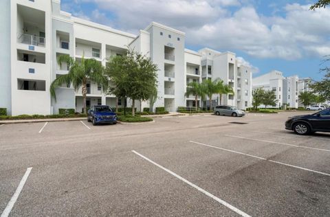 Photo of 4741 Clock Tower Drive #203, Kissimmee, FL 34746 (MLS # O6422815)