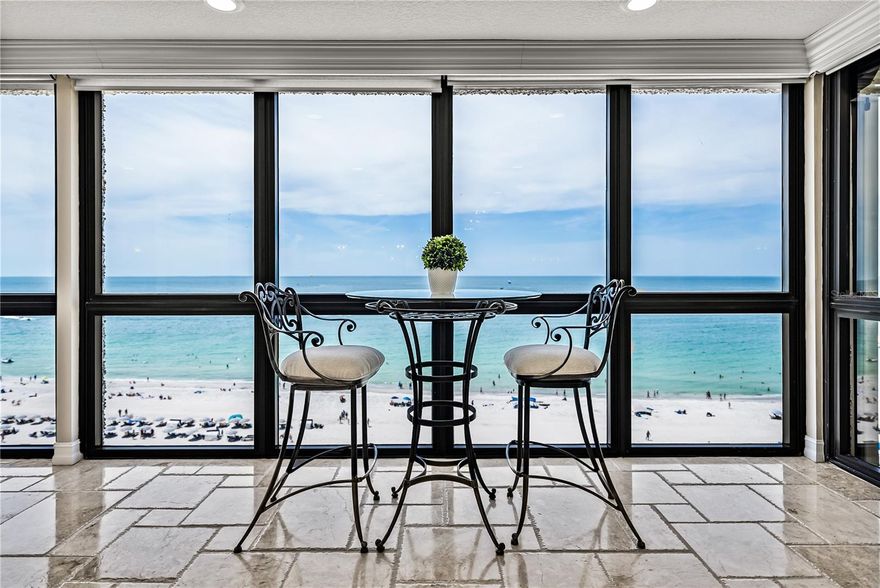 Under contract-accepting backup offers. At The Seamark, one beachfront unit literally stands above the rest. It is the Penthouse… The only Penthouse Residence. Spanning the entirety of the beachfront real estate for the building, unit 1102 enjoys 180-degree views of the beachfront and Gulf of Mexico. Please view the video, which is 'Set to Stun!' The views will always be of interest, not just a black expanse after sunset. The southern-facing picture window of the living area features the nightly LED lightshow of the Bellwether Beach Resort and beyond to the Don Cesar and Pass-a-Grille, as the coastline curls about the Gulf. Egmont Key is in the far distance. To the north, a matching picture window looks to the end of the island and beyond to Treasure Island, all the way to Clearwater in the far distance. The Gulf-front balcony spans the entirety of the beachfront. The pictures, though fabulous, do not do the experience justice. Even the video falls short of the breathtaking view in person. Imagine if you were living in the Owners Suite on a ultra-luxurious cruise. The view from the penthouse would be like the mirror image as the ship approaches a beautiful island, complete with fine, whisper-white sand and warm waters sparkling! That aptly describes the view whether you stand at the western windows or step out to the balcony to marvel at your good fortune as you enjoy that view for a fleeting moment… This, however, is a moment that can be extended with the stroke of a pen! This coveted unit has only changed hands twice. The Developer, William Axelrod, retained it as his private residence for many years and then sold it to friend, the former mayor of St. Petersburg and Congressman, Bill Cramer and his wife. Finally in 2015, his widow sold the unit to her neighbor of some 35-years. The Penthouse subsequently underwent an extensive remodel, taken down to the very studs and reimagined and built, to the impeccable current standards you see now. It features impact-resistant windows, beautiful travertine floors, smooth finish walls and superior cabinetry and fixtures. The two bedrooms, (which could easily be converted to three, which was the original floor plan,) each enjoy an ensuite full bath and a private balcony sporting fabulous views of the beach and bay. The plumbing and electrical systems were updated during the renovation and wood behind the walls was replaced with metal. No expense was spared. Indeed, the current owner was unhappy with the original floor installation and had it removed and redone to his discerning standards! The Seller will consider selling fully furnished.