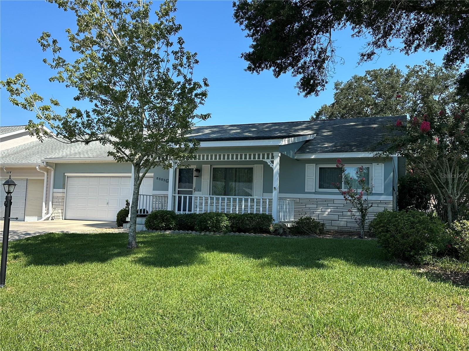 Spacious 2/2 Montgomery Model Villa with 2-Car Garage in Friendship Village – On Top of the World!
This beautifully updated end-unit villa offers privacy, upgrades, and comfort in Ocala’s premier 55+ gated golf community.
Inside, enjoy brand new luxury vinyl plank flooring and fresh paint (2025) throughout. The remodeled kitchen shines with quartz countertops, stainless steel appliances (Samsung refrigerator, GE range & dishwasher, LG microwave), updated cabinetry with pull-out spice rack, a Lazy Susan, dual pantries (one with pull-out shelving), and a stainless steel double sink with pull-down faucet.
The owner’s suite features a spacious walk-in closet and a remodeled bath with quartz vanity, glass-enclosed rain shower, built-in waterproof shelving, and extra storage. The guest bedroom includes a large closet, and the guest bath offers a tub with a quartz vanity. Additional storage includes linen and coat closets.
Other features: Rainier garage screen with remote, Genesis water conditioner, large utility sink, newer LG washer/dryer, and ceiling fans throughout, including the lanai. Outside, enjoy a private fenced backyard with mature shade trees, perfect for relaxing.
All this within On Top of the World, Ocala’s premier 55+ community loaded with golf, fitness centers, pools, clubs, and entertainment. Please take a look at the Matterport 3D Tour.