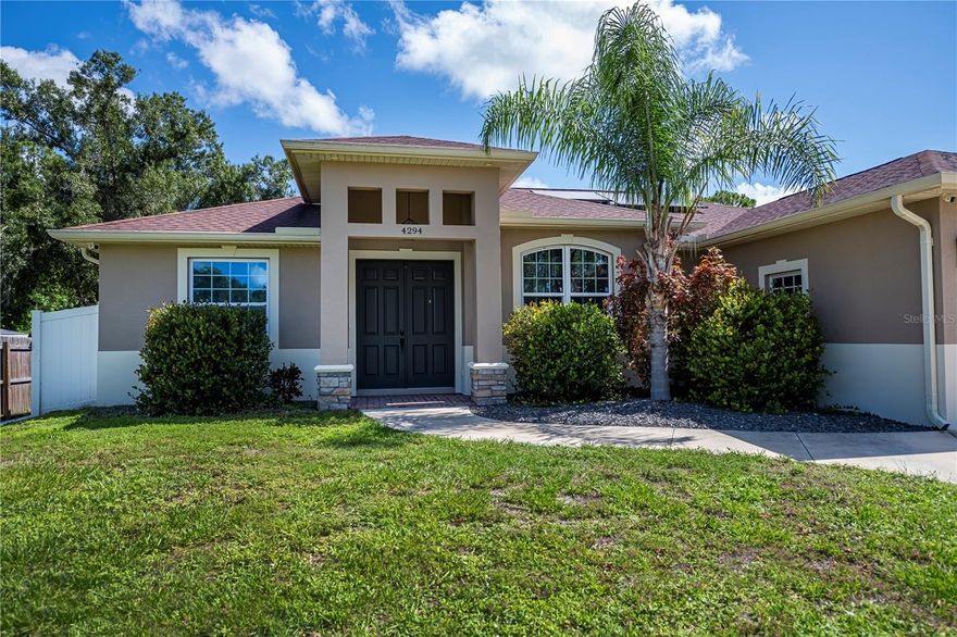 Experience EXCEPTIONAL SOLAR SAVINGS with $58K in Solar Panels Included!

Enjoy an incredibly low average electric bill of just $30 a month in this dazzling CUSTOM 2019 BUILT HOME. This 3-bedroom, 2-bathroom residence offers the perfect balance of luxury, functionality, and energy efficiency.

Step inside the beautiful home with stunning curb appeal that welcomes you to a SOARING ENTRYWAY, stone accents and formal foyer—setting the tone for elegance throughout.

The open floor plan features exquisite custom wood and tile flooring, creating a modern and inviting atmosphere. Relax in the luxurious living room with a RECESSED CEILING and a striking BUILT-IN STONE ACCENTED FIREPLACE/ Theatre—ideal for cozy gatherings and movie nights.

The CHEF'S KITCHEN is designed for excellence, boasting abundant cabinetry, rich granite countertops, amirrored subway tile backsplash, and fingerprint-resistant stainless steel appliances. Enjoy convenient features like a trendy POT FILLER, fully vented range hood, convenient breakfast bar, decorator pendant lighting, and a spacious walk-in pantry. The separate dining room opens through stylish FRENCH DOORS to a serene patio and private backyard—perfect for indoor-outdoor dining and entertaining.

Retreat to the spacious master suite filled with natural light, featuring a spa-like ensuite bath and a large walk-in closet, enhanced with updated lighting for a luxurious touch. Two well-appointed guest bedrooms share a contemporary hall bath in this thoughtfully designed split plan.

Additional highlights:

*ELECTRIC CAR CHARGER in the garage
*Whole-house REVERSE OSMOSIS water filtration system for pristine water quality
*Central vacuum system
*Hurricane-rated impact doors and windows
*Convenient inside laundry room
*Private FENCED YARD with room for a pool
*Spacious 2-car garage
*No HOA fees and located outside a flood zone for peace of mind
Located in vibrant North Port, enjoy easy access to Myakka State Park and Myakkahatchee Creek Environmental Center Park with miles of trails for hiking, horseback riding, bird watching, and biking. Nearby amenities include Punta Gorda Airport, dining, shopping, sports stadiums, beaches, Warm Mineral Springs, and the Aquatic Center.

DON'T MISS YOUR CHANCE to own this stunning, energy-efficient home with exceptional solar savings. Schedule your showing today!