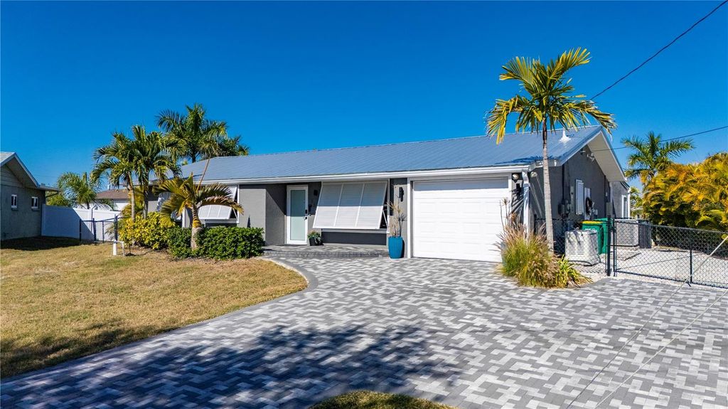 Photo of 186 Chelsea Court NW, Port Charlotte, FL 33952 (MLS # C7521710)