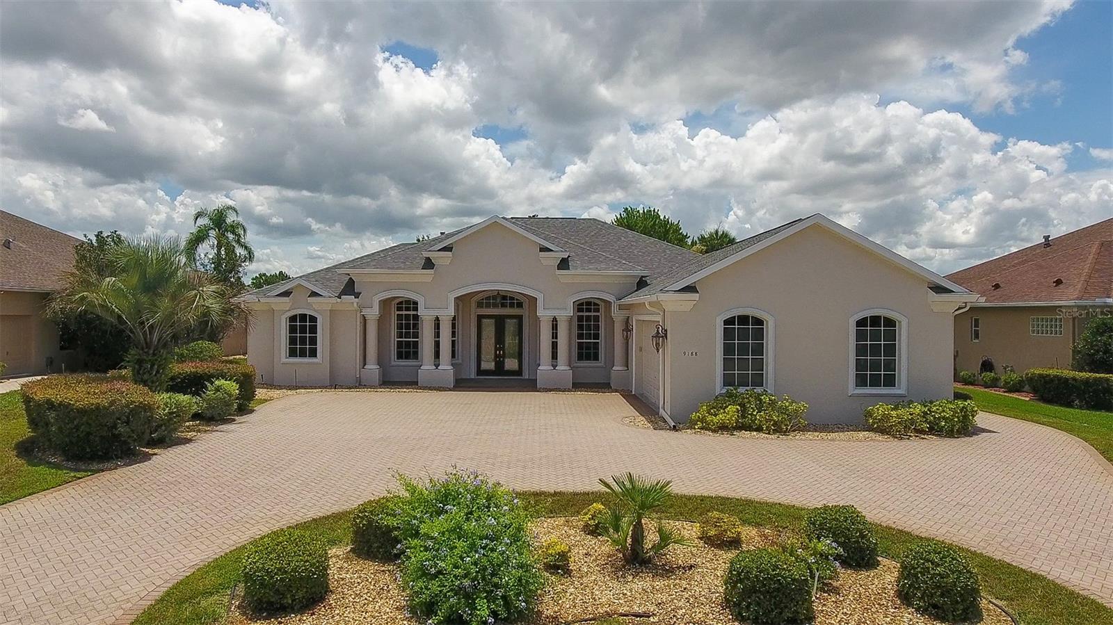 Glen Lakes 3 Bedroom Water Front Pool Home 3 Full Bathrooms And A Oversize 2 car garage With A Separate Attached Golf Cart Garage- Enter The Home Through A Dual Door Entry To A Wood Entry Foyer- Great Room With A Fireplace And Crown Molding- The Eat In Kitchen Has Wood Flooring, Cook Top Stove, Double Oven, Pantry, Breakfast Bar And granite Counter Tops- Separate Formal Dining Room And Library/Office With Built In Book Cases Both Rooms Have French Doors- The Primary bedroom Has 2 Walk In Closets With Organizers, Double Trey Ceiling, Garden Tub And Separate Shower And Dual Sinks- Extras Include Roof And Air Replaced 2023, Plantation Shutters, Transom Windows, Interior Paneled Doors, New Carpeting, Ceiling fans, Pool Bathroom, Inside Laundry Room With A Wash Tub And Wall cabinets, Irrigation System, Pool Heater, Open Floor Plan call Today For A Showing.