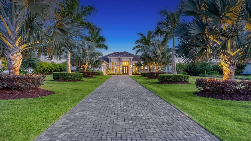 Privately set on a sprawling one-acre south-facing lakefront homesite with captivating preserve views, this 4,189 sq. ft. residence epitomizes luxury living in Concession. Quality construction by John Cannon Homes with impact doors and windows, architectural finesse and an array of upscale features, the main residence showcases three en-suite bedrooms, including a serene and spacious primary retreat. A separate attached casita with a private entrance serves as an ideal in-law suite, complete with one bedroom, a full bath, and kitchenette. The heart of the home lies in its impressive kitchen, seamlessly integrated with the great room and adorned with extended cabinetry, a center island with a split-level countertop, and a generous dinette space for casual dining. For special occasions, enjoy the formal dining room with soaring ceilings and heightened windows. A designated office and an en-suite bonus room further enhance the living experience, with disappearing pocket sliding doors from the bonus room blending indoor and outdoor living spaces effortlessly.  Admire stunning water views from the home’s interior, while outdoor enjoyment is elevated with a heated saltwater pool and spa, an outdoor kitchen, shaded lounging areas, and clear view screens.  The Concession is an exclusive gated neighborhood offering miles of picturesque trails for running, walking, and bike-riding. Residents can enjoy the esteemed Concession Golf and Country Club offering several levels of optional memberships including Social and Culinary. The community is a short drive to Lakewood Ranch and Sarasota shopping, dining, beaches, cultural venues, top-rated schools and medical facilities.