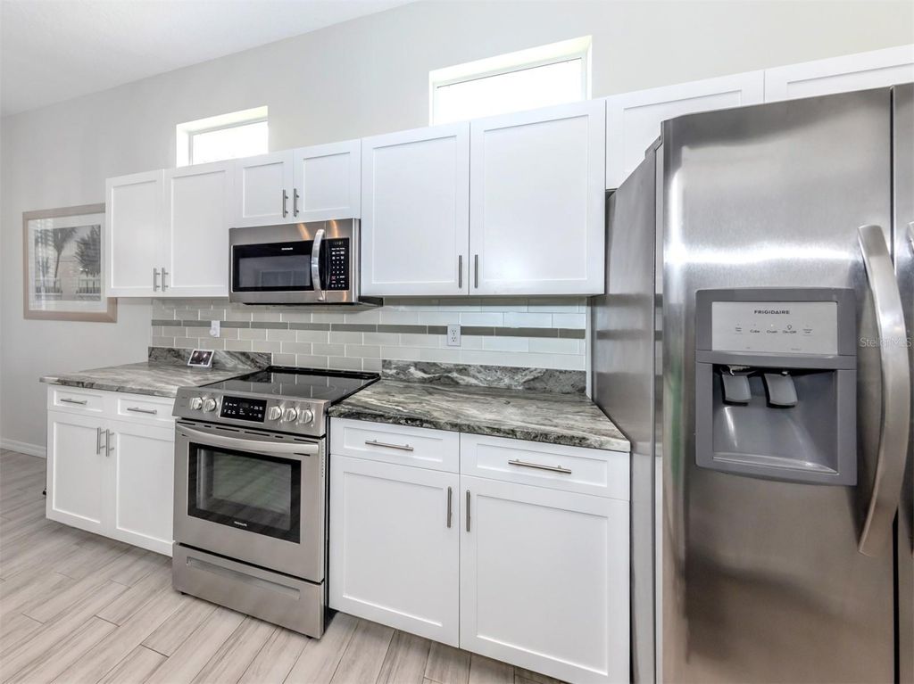 Photo of 1287 Lakeside Woods Drive, Venice, FL 34285 (MLS # N6139579)