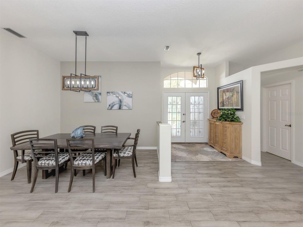 Photo of 1287 Lakeside Woods Drive, Venice, FL 34285 (MLS # N6139579)