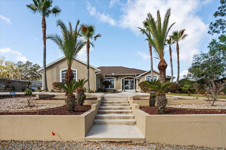 One or more photo(s) has been virtually staged. Welcome to your private retreat in the highly desirable Greater Country Club area of Lake City—where space, comfort, and lifestyle come together seamlessly. 

Location is everything—and this home delivers. Enjoy quick access to an 18-hole golf course just moments away, along with top-rated healthcare, shopping, dining, and entertainment all within minutes. With I-75 Exit 427 only five minutes from your doorstep, commuting to major cities like Orlando, Tampa, Miami, and Atlanta is incredibly convenient.

This expansive 4-bedroom, 3-bath residence is thoughtfully designed for both everyday living and grand entertaining. From the moment you arrive, the home makes a lasting impression with its stately entrance framed by soaring palm trees, evoking the elegance of a villa or private estate.

Inside, you’ll find a well-planned layout that offers distinct, functional spaces for every aspect of modern living. The oversized primary kitchen features ample workspace and a cozy eat-in breakfast area. A secondary cooking space in the massive Florida room creates an exceptional setup for hosting large gatherings and celebrations with ease. The adjoining media room adds yet another dimension—ideal for movie nights, game days, or simply unwinding.

Natural light pours in through numerous sliding windows, enhancing the airy, open feel throughout the home. Granite and marble tile flooring not only elevates the interior aesthetic but also ensures low-maintenance, long-lasting durability. Each bedroom is a private haven, complete with closets lined in sandalwood panels that provide a subtle, natural fragrance and a touch of luxury.

Built with solid concrete block construction reinforced with rebar, this home offers peace of mind along with enduring quality. The property is equipped with city water for household use and well water for efficient yard irrigation.

Best of all, with no HOA restrictions, you have the freedom to bring your lifestyle with you—whether that includes RVs, boats, or other recreational vehicles.

This is more than a home—it’s a statement of space, comfort, and freedom.