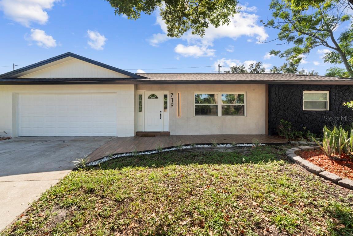 One or more photo(s) has been virtually staged. Fully remodeled with a brand-new roof, this East Orlando (32825) home offers 4 beds/2 baths plus a private 1/1 guest suite with living room and kitchenette space—perfect for rental income or in-laws. Modern kitchen with quartz counters and stainless steel appliances, open floor plan, and private pool with screen enclosure. Two-car garage + driveway for 2 more (total 4 parking spaces). Prime location: minutes to UCF, Valencia College East, Waterford Lakes Town Center, and near Avalon Park, with quick access to SR-408 and Alafaya Trail. Move-in ready!