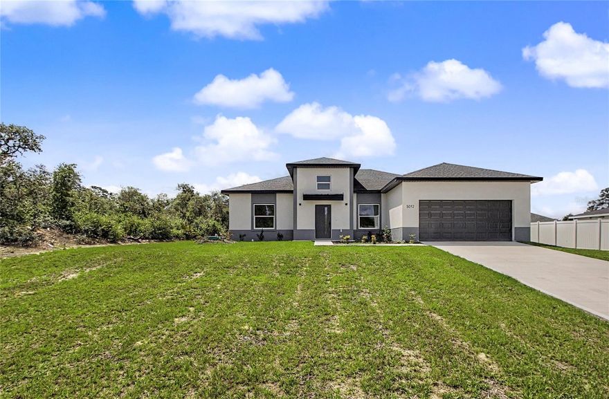 Real quality for those who like to live with style — Here’s what is different about this home than most New Construction — Bigger heated square footage and 10 ft High Ceiling throughout!  — Statement window above front door — Spacious Primary Suite with huge walk-in closet, Spa-level bathroom with freestanding Soaking Tub, Fully Tiled Walk-in Shower, dual vanities and private window for natural light — Privacy: Wooded backdrop and side privacy for a quiet, serene feel you can actually hear the birds — Patio offers outdoor kitchen rough-ins, ideal for entertaining outside — Long driveway offers extra parking for your guests — Large kitchen with abundant cabinet space and pantry — All Appliances included — Washer and Dryer too — Home warranty included  for added peace of mind. ——

Located in a rapidly growing community — Marion Oaks is not just growing, it is arriving — 15 min access to major corridors including SR-44/SW 484 for shopping, dining  —  A new Publix shopping center and new Walmart Supercenter are coming— Chipotle, Sprouts, Miller's Ale House, and more are opening along the SW corridor — Top schools, hospitals, and daily essentials nearby, while still offering privacy and tranquility. — This house is Bigger. Brighter. Better built and Move-in ready.