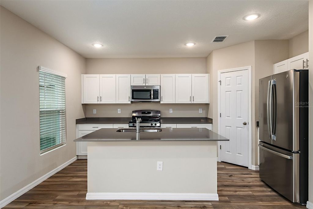 Photo of 1310 Palmeroy Road, Haines City, FL 33844 (MLS # TB8445514)