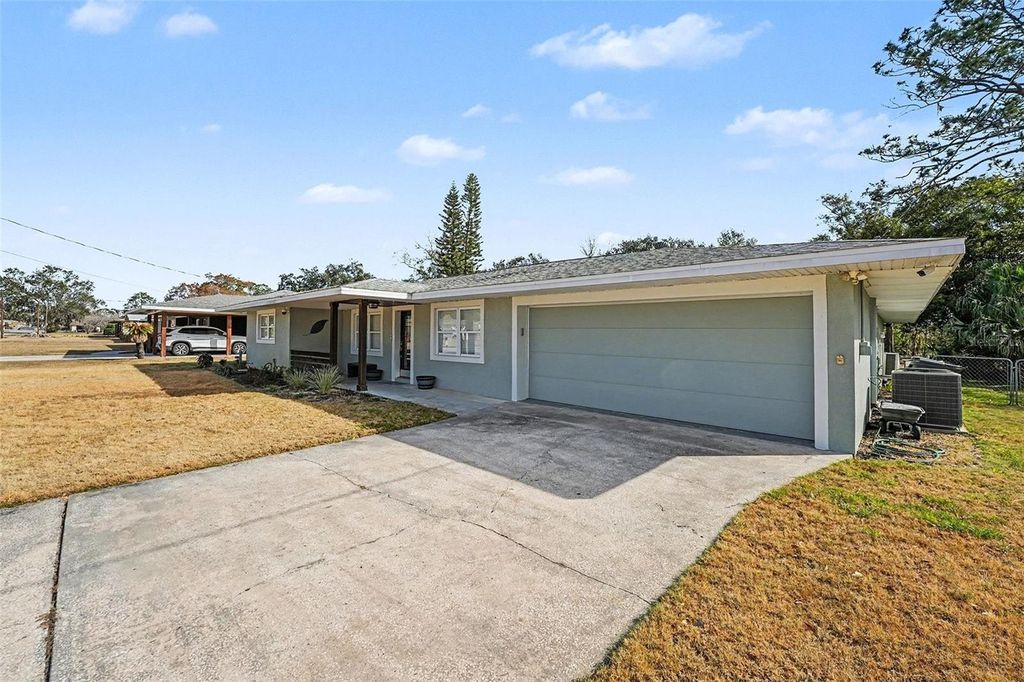 Photo of 5811 Lake Breeze Avenue, Lakeland, FL 33809 (MLS # TB8472594)