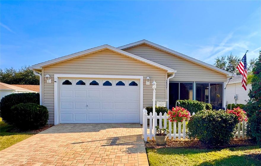 Welcome to this beautifully maintained 2-bedroom, 2-bath Cabot Cove Patio Villa perfectly located in the Village of Duval, just south of Lake Sumter Landing. This IMMACULATE home offers an inviting blend of comfort and style, highlighted by vaulted ceilings, no carpet, and a bright, open layout that lives larger than expected. The kitchen has been tastefully enhanced with beautifully painted cabinets, QUARTZ countertops, and newer appliances, creating a fresh, modern feel. A 2-year-old roof adds peace of mind, while the brick-paved driveway, walkway, and patio elevate the home’s curb appeal. The enclosed lanai provides a relaxing all-season space, and the car-coated garage floor adds a clean, finished touch. Inside laundry includes a stacked washer and dryer, allowing room for additional cabinetry plus a generous pantry closet. Thoughtful landscaping frames the home beautifully, and the property is being offered partially furnished for added convenience. With its exceptional condition and prime location near golf, pools, shopping, and Lake Sumter Landing, this villa is truly move-in ready and a standout in today’s market. Call today!