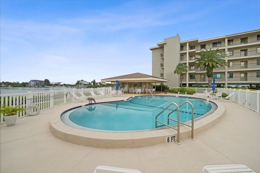 Rarely does a home come along where the view is as unforgettable as the lifestyle—this highly sought-after Gulf-front end-unit in Sand Pebble Pointe is one of them. Evenings here are defined by glowing West-facing sunsets that spill across the horizon, dolphins playing offshore, and sailboats drifting by. From your lanai, living room, or primary suite, the Gulf isn’t just a view—it’s the backdrop to everyday living. Step inside and you’ll feel the calm of a space designed for both style and peace of mind. The Milestone Inspection and SIRS are complete, the association reports no upcoming assessments, and the HOA is fully funded. The building itself was thoughtfully constructed with residences elevated above the parking level, offering added confidence and uninterrupted enjoyment of the coastal lifestyle. Newly installed hurricane-impact windows and doors provide energy efficiency, quiet comfort, and protection from the elements. Inside, the property reflects a comprehensive remodel. Every detail was addressed—from lighting and fixtures to finishes, and even the plumbing. The kitchen features granite counters, shaker cabinetry, and stainless-steel appliances, all opening seamlessly to the dining and living areas where water views take center stage. Luxury vinyl flooring runs throughout, offering a cohesive, low-maintenance look that complements the relaxed elegance of coastal life. The primary suite is a true retreat—wake up to the shimmer of the Gulf, step out to the lanai for morning coffee, and unwind in a spa-inspired bath with double vanities and a spacious walk-in closet. Guests enjoy their own private wing thanks to the thoughtful split-bedroom layout. Sold partially furnished (if desired), the home also features new plantation shutters throughout. Parking is equally impressive—your premium garage space is nearly enclosed and conveniently located near your unit, complete with a storage locker and bike rack. An additional parking space and the building’s elevator add to the ease of ownership. Beyond your door, Sand Pebble Pointe feels like a private resort. Swim year-round in one of two heated pools, grill with neighbors, stroll the waterfront boardwalk, or perfect your short game on the putting green. The clubhouse includes a fitness center, library, game room, and beautiful gathering spaces owners can reserve for private events at no cost. Active residents enjoy tennis and pickleball courts, while water lovers have access to a private community boat ramp, kayak storage, and opportunities for boat or RV storage and docks when available. With direct open-Gulf access and no bridges, weekends can mean exploring nearby islands like Anclote or Three Rooker or simply floating beneath a painted sunset sky. Ownership here means simplicity and peace of mind, with monthly HOA fees covering cable and high-speed internet (with premium channels), sewer, trash, exterior maintenance, and building insurance—allowing you to spend more time enjoying the lifestyle and less time worrying about the details. Just outside the gates, you’ll find waterfront restaurants, a public boat ramp, and the Port Richey Marina offering wet slips, fuel, daily rentals, and Freedom Boat Club memberships. This home represents exceptional value and an unmatched blend of comfor, and coastal beauty. It’s a front-row seat to Florida’s most beautiful sunsets, a community that feels like vacation, and a lifestyle built for those who appreciate both serenity and the sea.