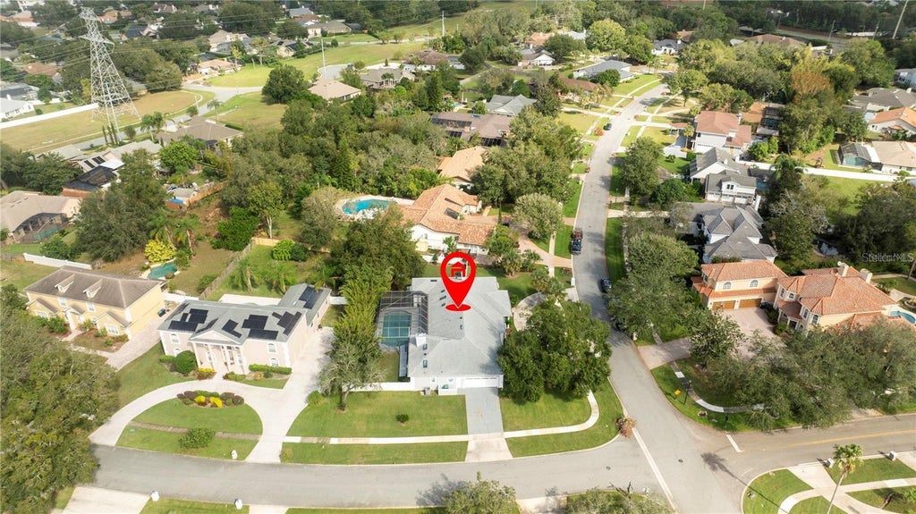 Photo of 5646 Masters Boulevard, Orlando, FL 32819 (MLS # O6415354)
