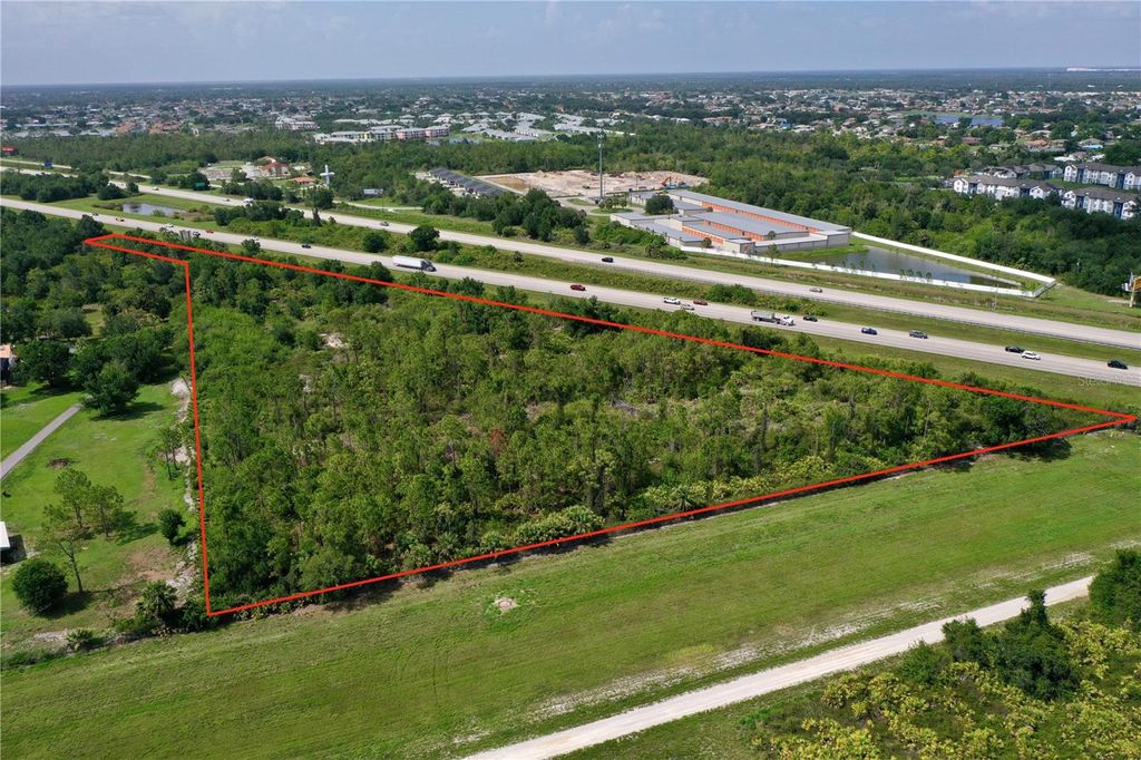 Photo of 24869 Nova Lane, Port Charlotte, FL 33980 (MLS # C7511130)