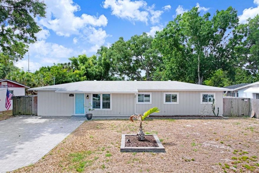 Welcome to your South Tampa oasis—an exceptional pool home offering the perfect blend of style, comfort, and convenience, all under $600,000. This beautifully maintained 4-bedroom, 2-bath residence features a highly desirable open great room floorplan, ideal for both everyday living and entertaining.

The heart of the home is a stunning, thoughtfully designed kitchen complete with white shaker cabinetry, elegant glass display cabinets, solid stone countertops, a floor-to-ceiling pantry, and a spacious island. Stainless steel appliances, a classic white subway tile backsplash, and stylish pendant lighting complete the space, making it as functional as it is beautiful.

Engineered hardwood flooring flows throughout the home, enhancing its warmth and modern appeal. A generously sized laundry room adds convenience, and yes—washer and dryer are included.

Step outside to your private backyard retreat, designed for low-maintenance living with a fully fenced yard and turf lawn. The showstopper is the gorgeous heated, saltwater pool (2021) featuring a sun shelf, surrounded by travertine pavers and an expanded covered patio—perfect for grilling, relaxing, and entertaining year-round.

Major updates provide peace of mind, including Roof (2021), HVAC (2021), Pool Pump (2021), and Pool Heater (2021). Several windows were replaced in 2017. The home experienced no damage or flooding during the 2024 storms, and current flood insurance is just $800/year.

Additional highlights include a large storage shed and ample parking.

Ideally located near Robinson High School, home to the sought-after International Baccalaureate Program, and just minutes from the Crosstown Expressway—offering easy access to downtown Tampa and St. Petersburg.

This move-in-ready home truly checks all the boxes—schedule your showing today! No homeowner Association fees.